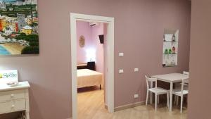 Postel nebo postele na pokoji v ubytování Guest House Le Tre Spezie