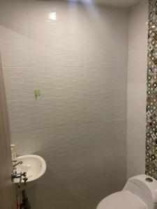 Koupelna v ubytování Apartamento con Vista al Mar + 4 fotografie