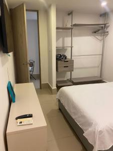 TV a/nebo společenská místnost v ubytování Apartamento con Vista al Mar