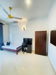 Μια τηλεόραση ή/και κέντρο ψυχαγωγίας στο Amity Villa +27 φωτογραφίες