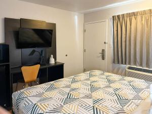 Ένα ή περισσότερα κρεβάτια σε δωμάτιο στο Motel 6 Cheyenne, WY +21 φωτογραφίες