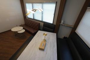 Posezení v ubytování 碧の宿べっぷ駅前町