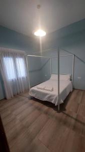 Postel nebo postele na pokoji v ubytování The Hummingbirds