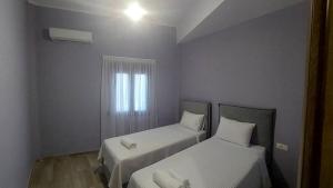 Postel nebo postele na pokoji v ubytování The Hummingbirds