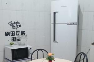 Køkken eller tekøkken på Minha Casa Seu Lar