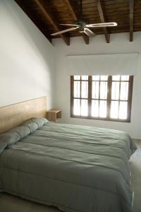 Postel nebo postele na pokoji v ubytování Grin Apartments