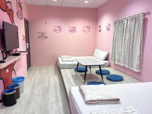 TV a/nebo společenská místnost v ubytování Xiao Liuqiu 539 民宿