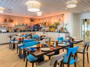 Un restaurante u otro lugar para comer en Residhome Toulouse Tolosa