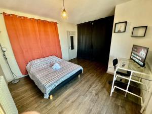 Ένα ή περισσότερα κρεβάτια σε δωμάτιο στο Hyper Centre de Valence - Grand Studio N54