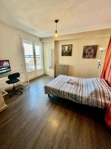 Ένα ή περισσότερα κρεβάτια σε δωμάτιο στο Hyper Centre de Valence - Grand Studio N54