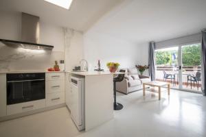 Η κουζίνα ή μικρή κουζίνα στο Aparthotel Marsol