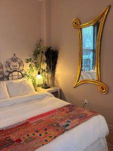 Кровать или кровати в номере Caye Caulker Boutique Guesthouse 2