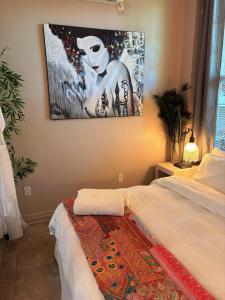 Кровать или кровати в номере Caye Caulker Boutique Guesthouse 2