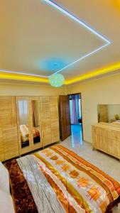 a large bedroom with a large bed in a room at Villa Sabrina in Awlād ‘Umar