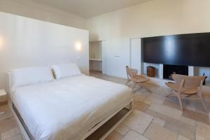 Телевизор и/или развлекательный центр в Monteforte Suite & Spa