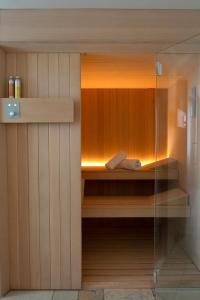 Кровать или кровати в номере Monteforte Suite & Spa