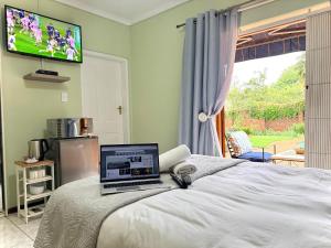 TV a/nebo společenská místnost v ubytování Map's View Guesthouse