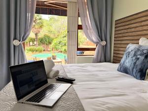 Postel nebo postele na pokoji v ubytování Map's View Guesthouse + 135 fotografií