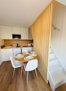 Køkken eller tekøkken på Studio Spa Du Bassin