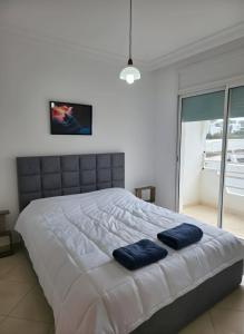 Postel nebo postele na pokoji v ubytování Designer Beach House - Near Grand stadium