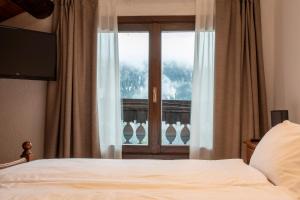 En eller flere senge i et værelse på Locanda dal Giulio al Fratè B&B + 37 billeder