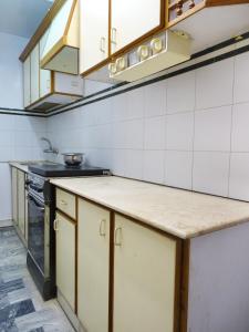 Kuchyň nebo kuchyňský kout v ubytování Hotel Galaxy + 19 fotografií