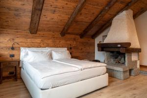 En eller flere senge i et værelse på Locanda dal Giulio al Fratè B&B