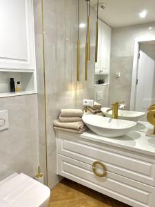 Et badeværelse på Mia Baltic apartament Greeneri Park