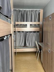 Postel nebo postele na pokoji v ubytování Hostel64