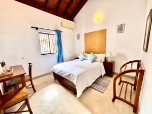 Postel nebo postele na pokoji v ubytování Nest Villas