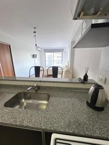 Køkken eller tekøkken på Moderno monoambiente + 1 billede