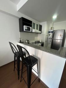 Køkken eller tekøkken på Moderno monoambiente