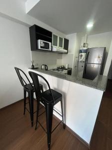 Køkken eller tekøkken på Moderno monoambiente