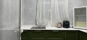 Kuchyň nebo kuchyňský kout v ubytování In The Peaks + 10 fotografií