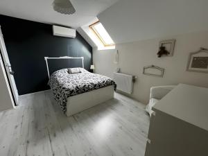 Postel nebo postele na pokoji v ubytování Chambre D'hôtes La Bienvenue -