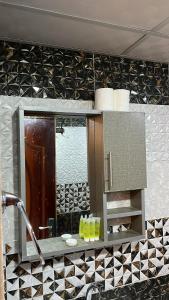 a bathroom counter with a sink and a mirror at Madonna Rum camp bubbles & Jeep tours in Wadi Rum +198 photos
