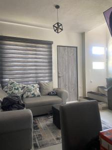 Posezení v ubytování Puerta Al Sol Diamanté