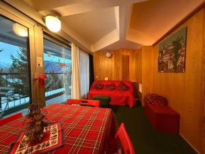 Ένα ή περισσότερα κρεβάτια σε δωμάτιο στο Appartamento Cinzia Residence Solaria Marilleva 1400 +90 φωτογραφίες