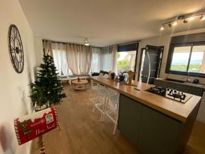 Kuchyň nebo kuchyňský kout v ubytování Longanea 2 + 6 fotografií