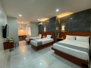 TV a/nebo společenská místnost v ubytování HOTEL OSHO