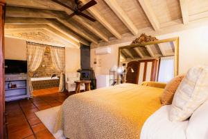 a bedroom with a large bed in a room at Hotel Barosse in Jaca