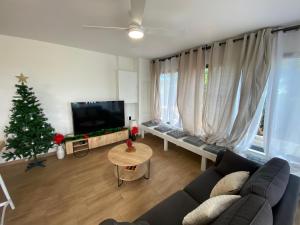 TV a/nebo společenská místnost v ubytování Longanea 2