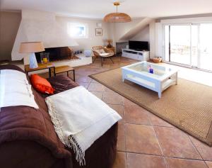 En eller flere senge i et værelse på La villa Jabadao - Les Gîtes de la Côte d'Amour