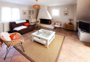 Et tv og/eller underholdning på La villa Jabadao - Les Gîtes de la Côte d'Amour