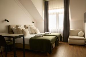 Кровать или кровати в номере Stodoła U Gajdy