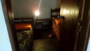 Postel nebo postele na pokoji v ubytování ALQUILO CASA FRENTE AL MAR PARQUE DEL PLATA CON BARBACOA PARa 8