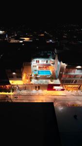 a view of a building at night with lights at Hotel Nilas in Tarapoto