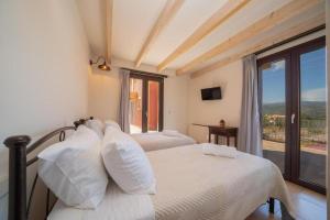 Ένα ή περισσότερα κρεβάτια σε δωμάτιο στο Villa Ostria +14 φωτογραφίες