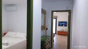 Giường trong phòng chung tại ÁTICO EN PRIMERA LINEA DE PLAYA