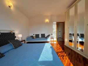 En eller flere senge i et værelse på Villa Maria - Relax & Comfort with Solarium